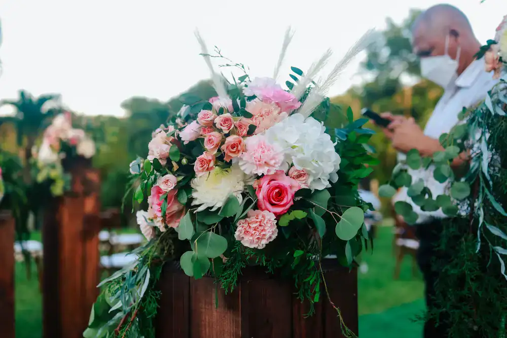 Tall architectural floral arrangement on a pedestal